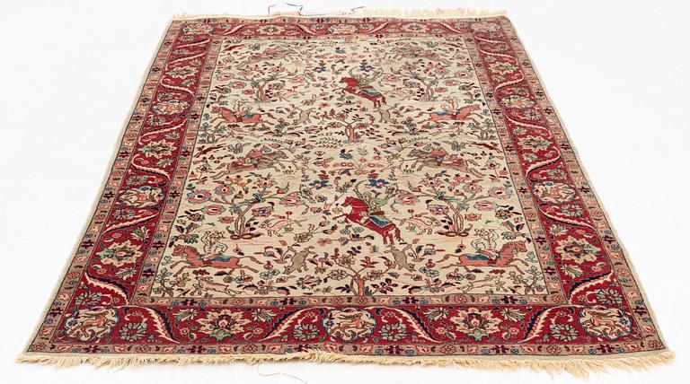An oriental, figural rug, c. 230 x 145 cm.