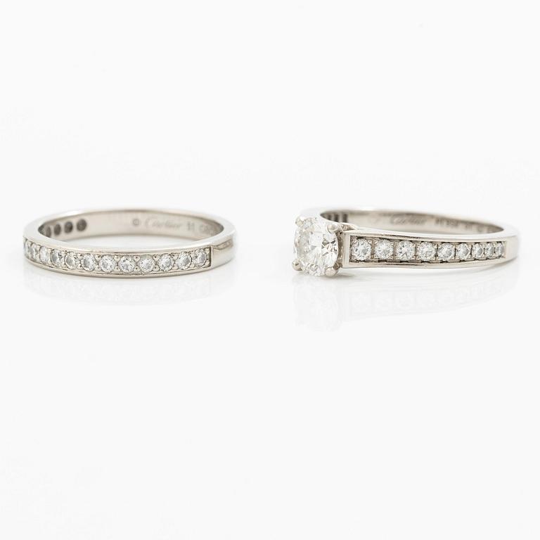 Cartier two rings platinum with round brilliant-cut diamonds.