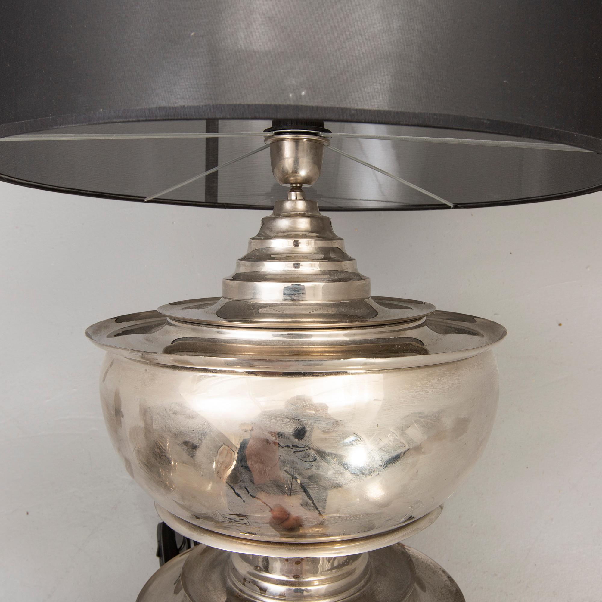 A pair of Eichholtz "Pagoda" 21st century metall table lamps.