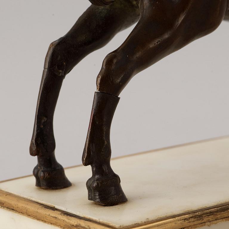 A Baroque 17th century bronze figure of a horse.