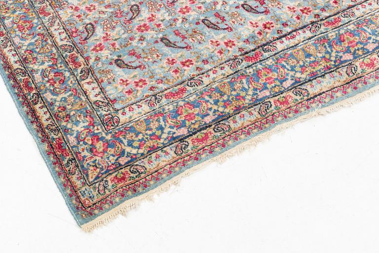 A Persian rug, c. 220 x 140 cm.