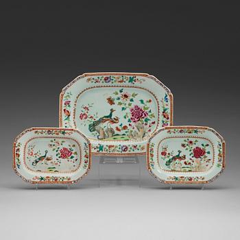 A set of three famille rose 'double peacock' serving dishes, Qing dynasty, Qianlong (1736-95).