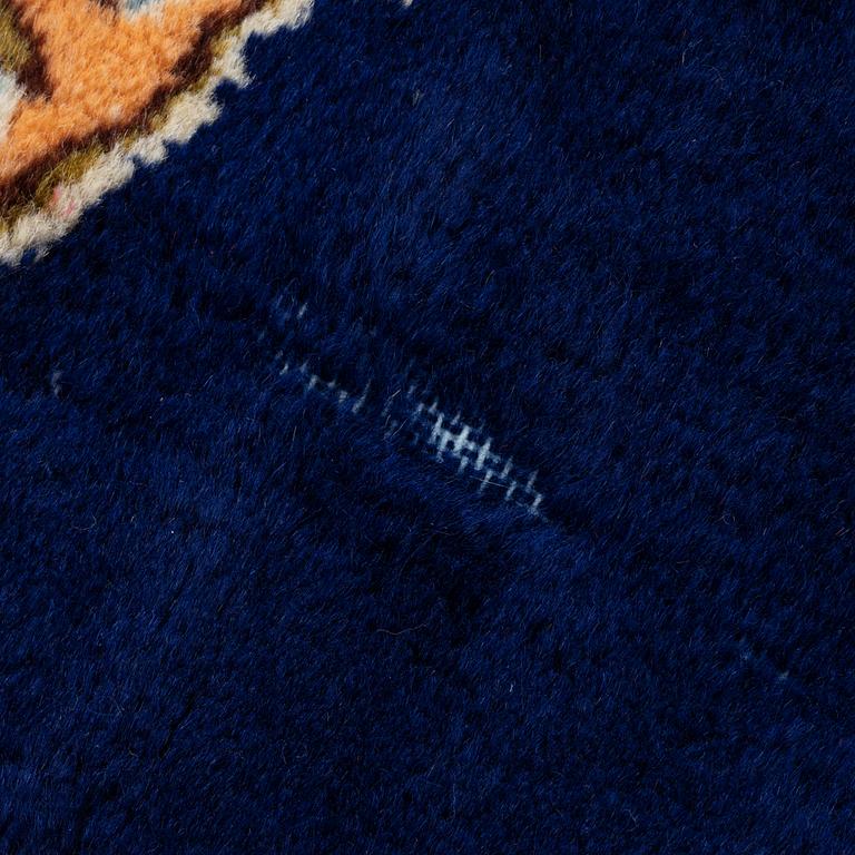 An old Kerman rug, ca. 249 x 148 cm.