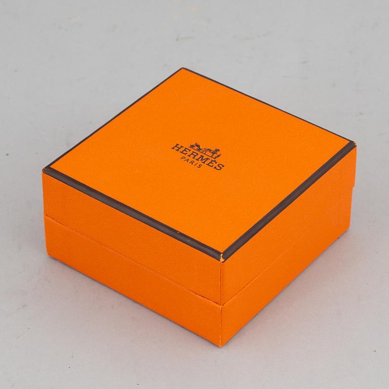 HERMÈS, a 'Clic H' bangle.