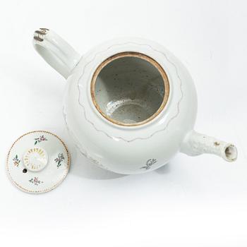 Cups and saucers, 11+7, and a teapot in famille rose with monogram, company porcelain, China, 18th century.