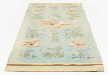 An antique Mongolian flat weave tapestry, c 285 x 120 cm (with 34 and 21 cm sewn in fabric at the ends).