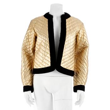 482. YVES SAINT LAURENT, a gold colored leather jacket.Size 34.