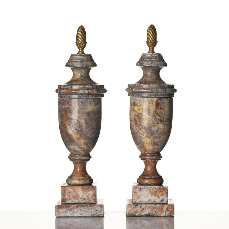 A pair of marble urns, around year 1900.