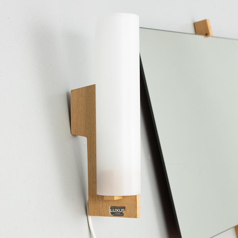 Uno & Östen Kristiansson, wall-mounted dressing table with wall lamps and stool, Luxus, 1960s.