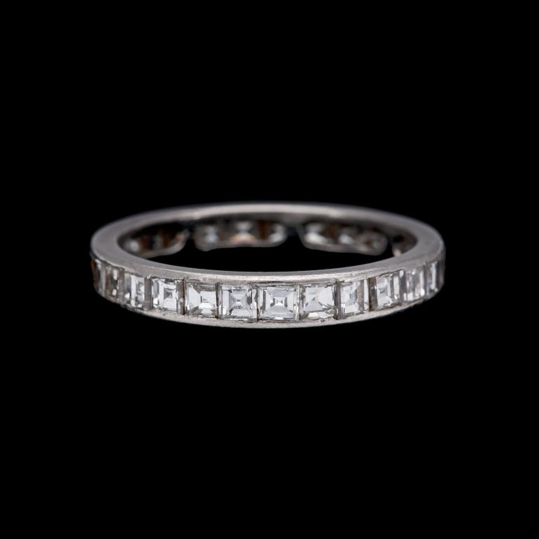 A princess cut diamond eternity ring, tot. app. 0.90 cts.