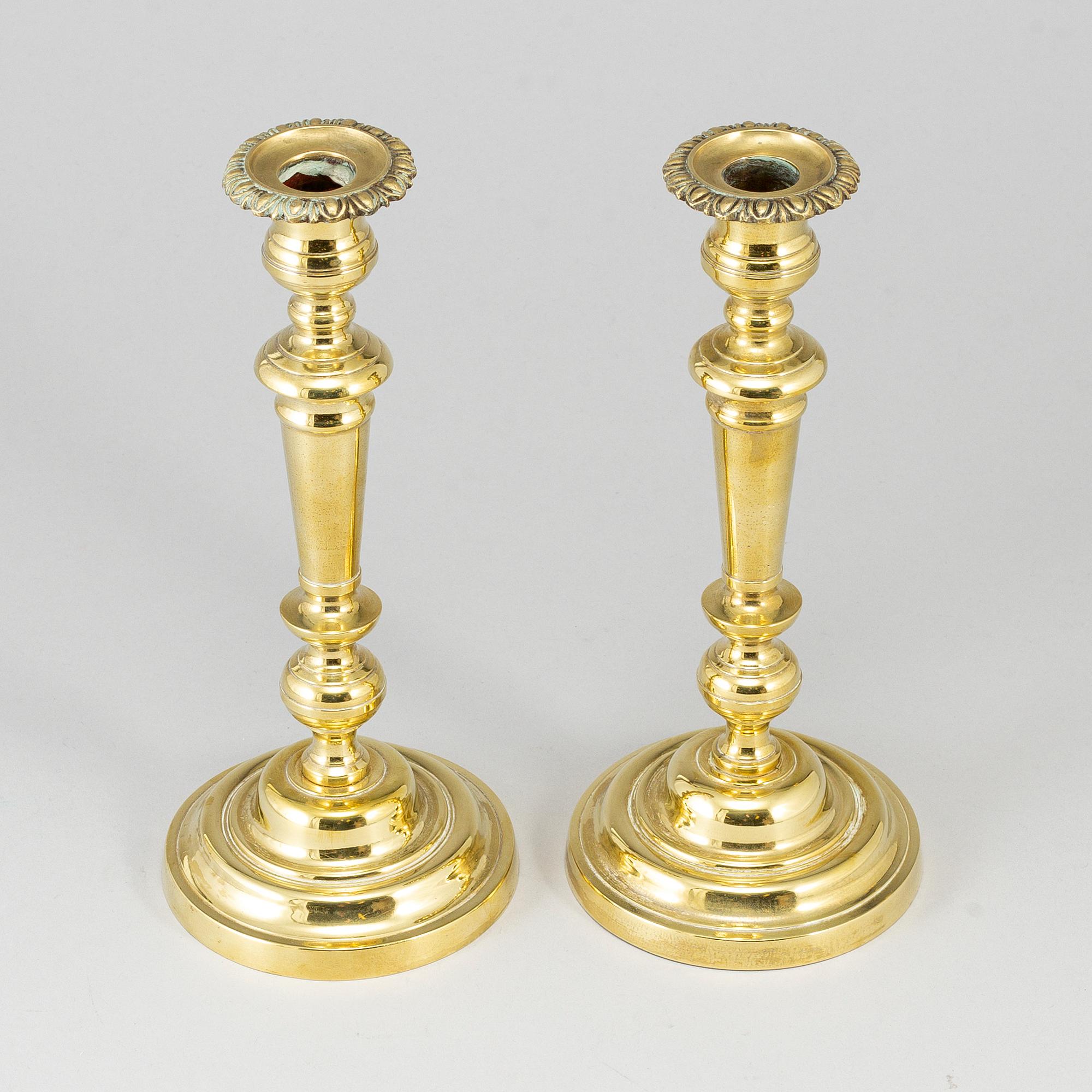 A pair of bronze candlesticks, first half of the 19th century.