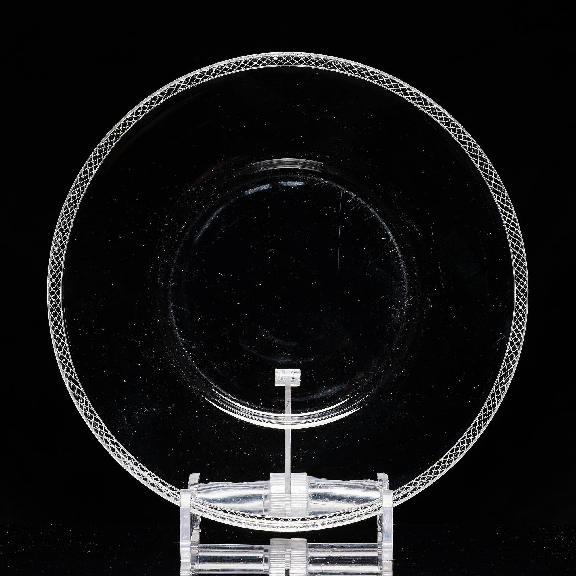 Edward Hald, an engraved glass bowl with plate, Orrefors, Sweden, 1926, model 305, engraved by Emil Goldmann.