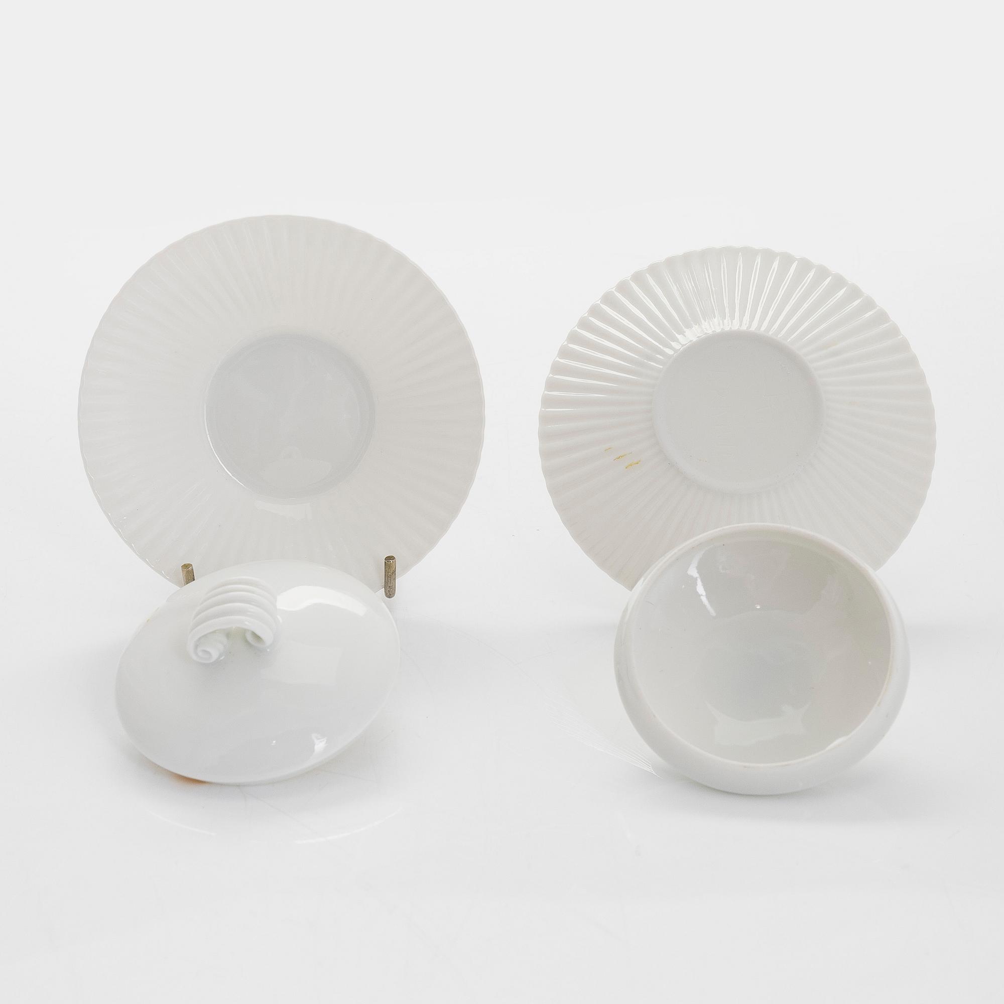 Aune Siimes, twelve porcelain custard cups signed AS ARABIA, 1950s/60s.