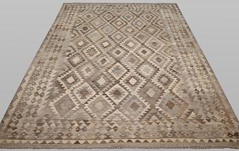 A Kilim rug, approx. 288 x 205 cm.