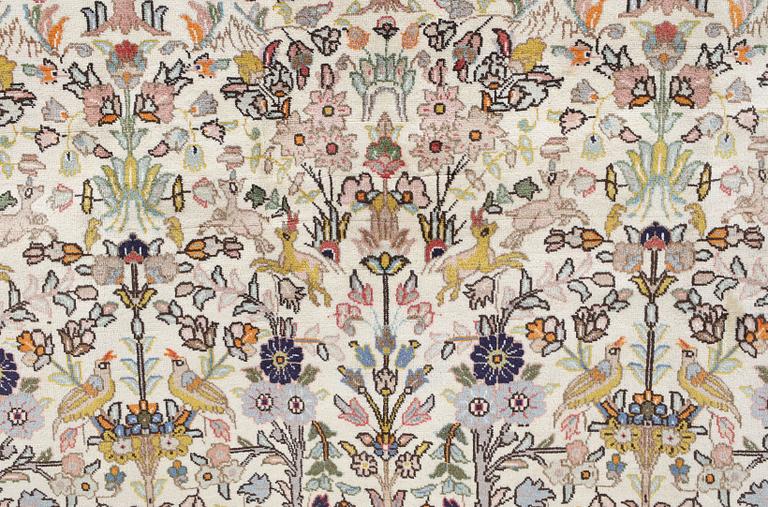 A Täbriz Tabatabai carpet, c.  352 x 240 cm.