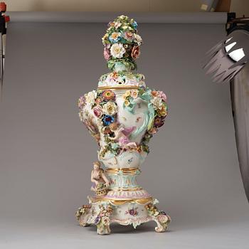 A large Meissen porcelain flower-encrusted pot-pourri vase, cover and stand, late 19th century.