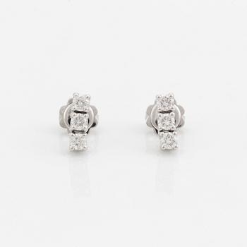 Brilliant-cut diamond earrings.