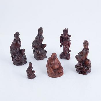 Six carved wooden figurines, China, 20th century.