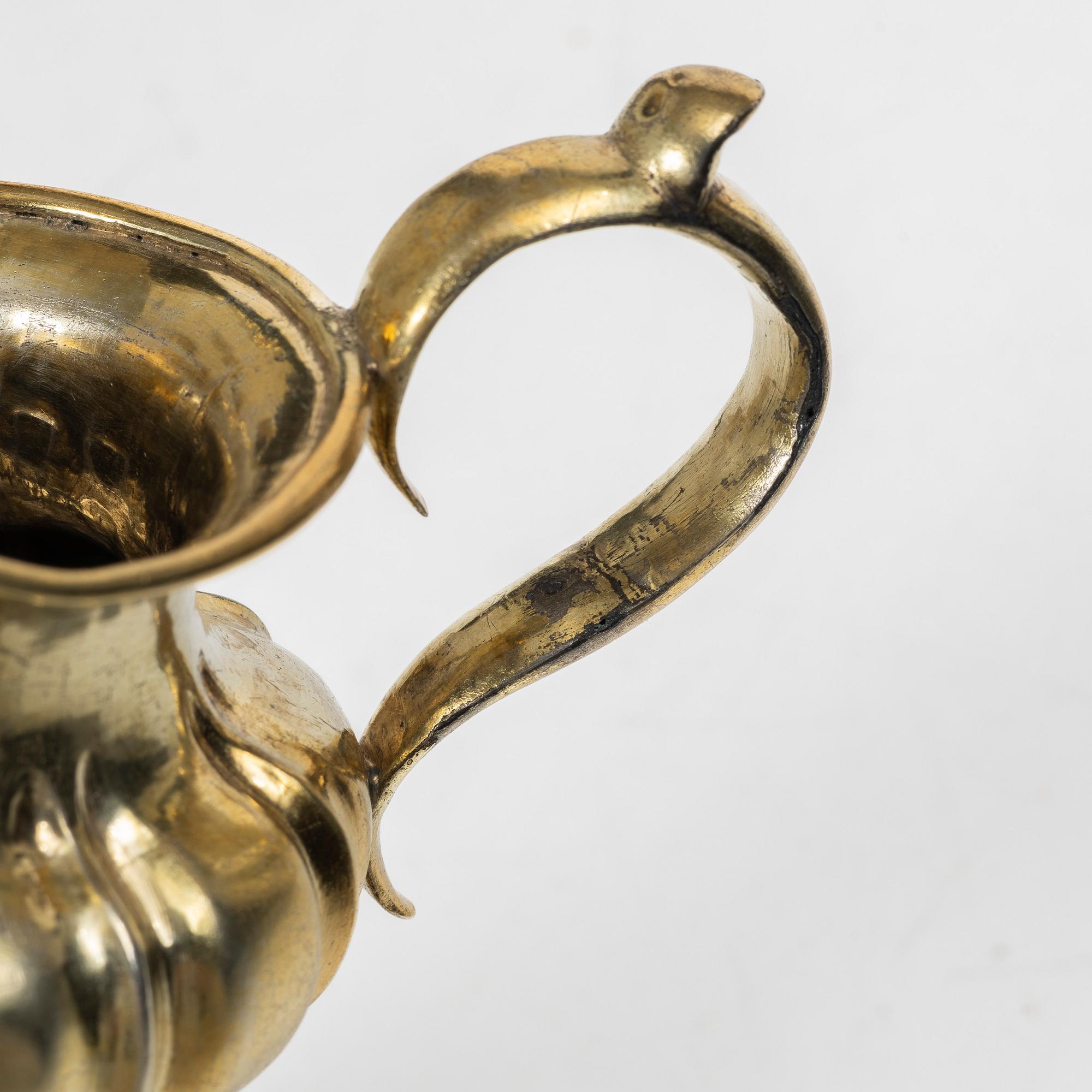 A Russian silver-gilt cream jug, Minsk, 1860s.