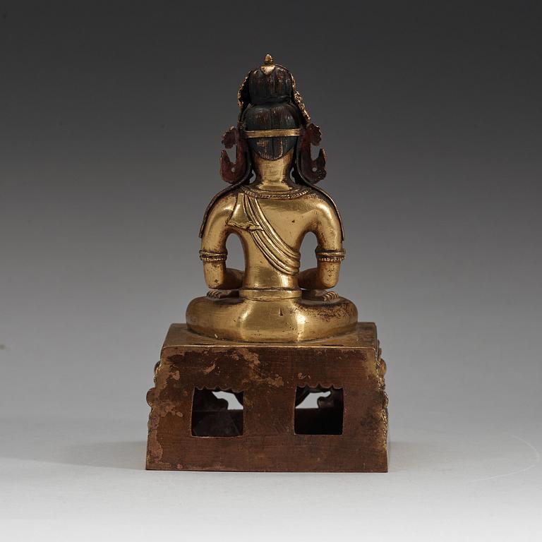 A gilt copper alloy figure of Amitayus, Qing dynasty, Qianlong (1736-95).