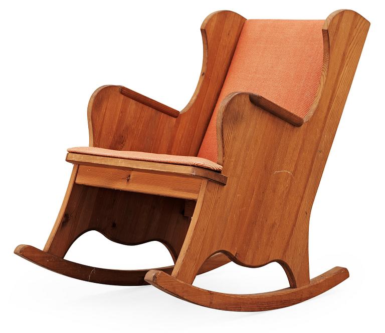 An Axel Einar Hjorth 'Lovö' stained pine rocking chair Nordiska Kompaniet, 1930's.