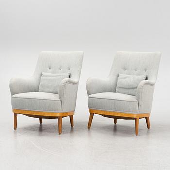 Carl Malmsten, attributed to. A pair of inlay easy chairs, mid 20th Century.