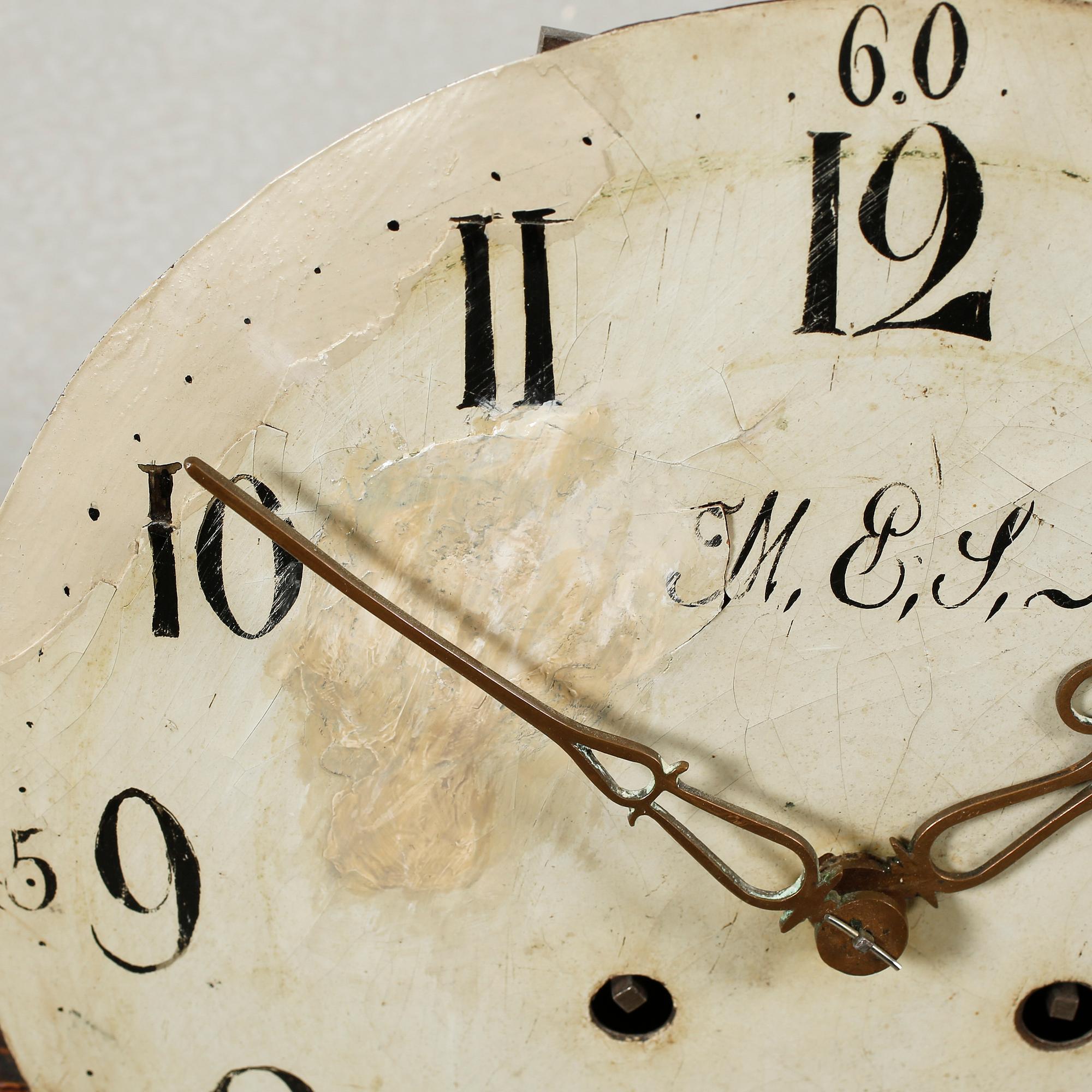 A grandfather clock dated 1823.