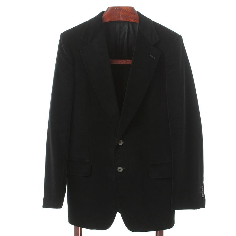 YVES SAINT LAURENT, a black velvet jacket.