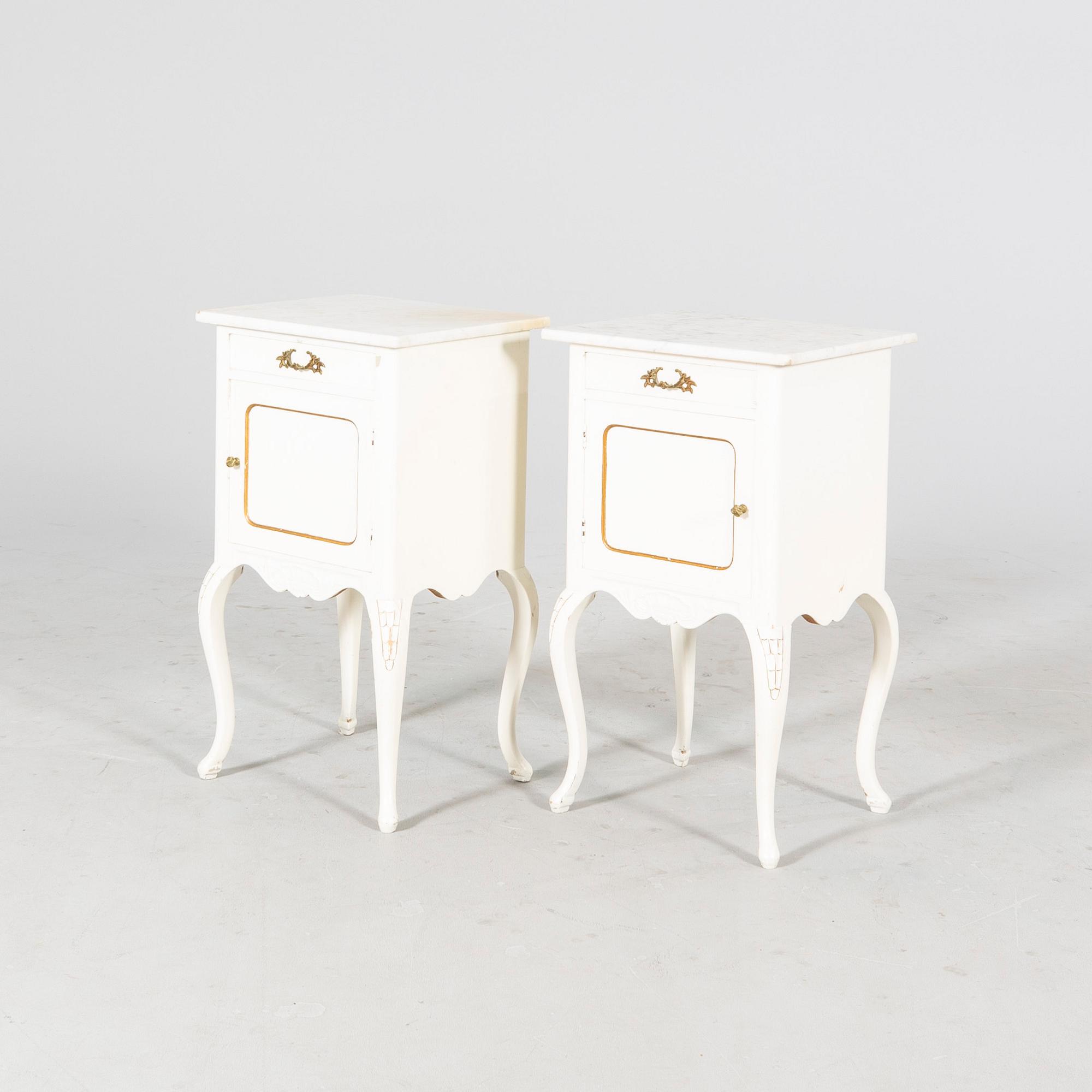 A pair of painted Rococo style bedside tables mid 1900s.