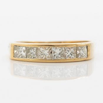 14K gold ring with princess-cut diamonds.