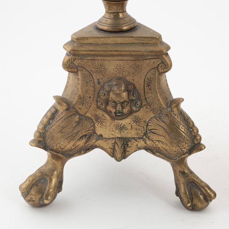 A pair of Baroque-style bronze candlesticks, 19th Century.