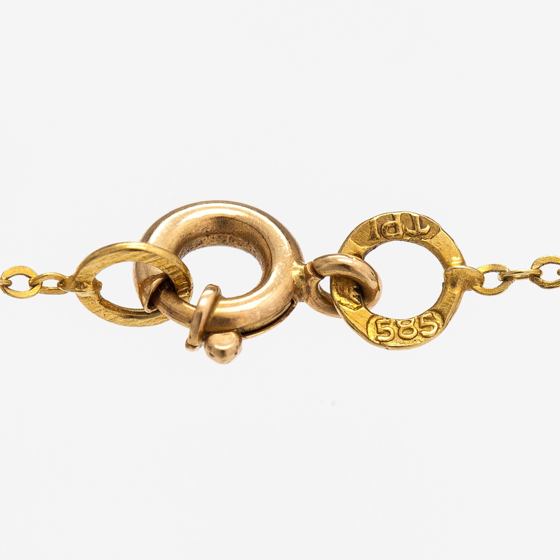 Halsband, 14K guld och rökkvarts. Auran Kultaseppä, Åbo.