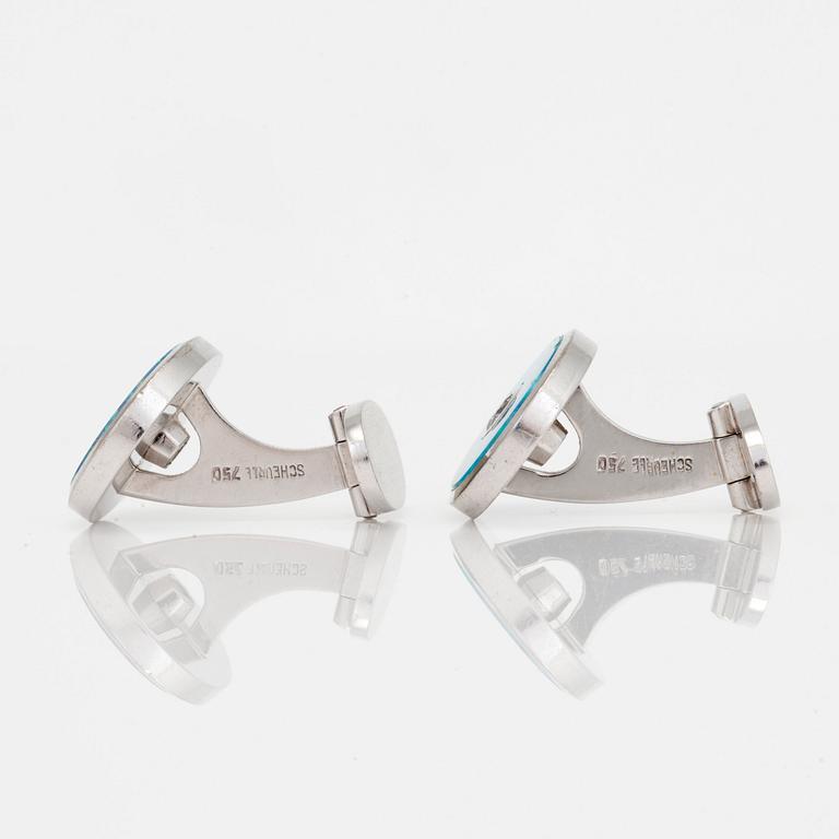 A pair of Quinn Scheurle opal and diamond cufflinks.