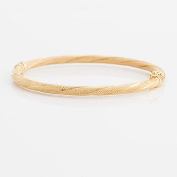 Bangle, 18K gold, twisted decoration, Uno A Erre, Italy.