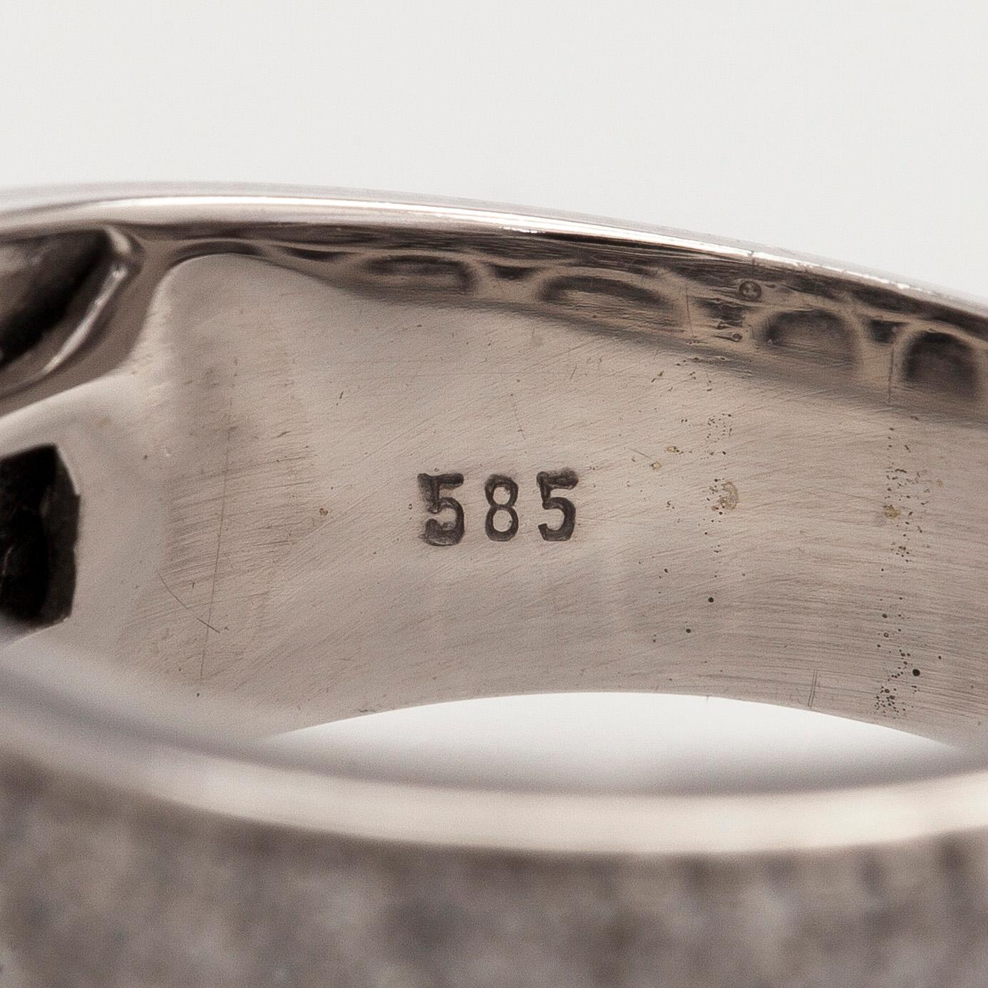 Sormus, 14K valkokultaa ja 8/8-hiottuja timantteja.