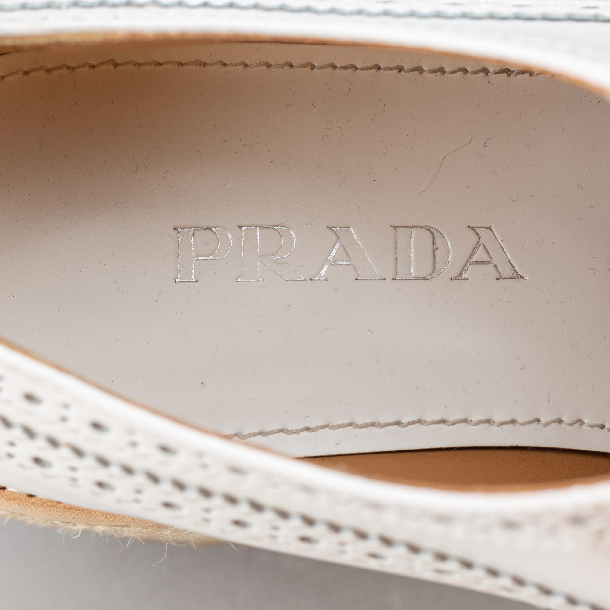 Prada, a pair of white leather brogues, size 36.
