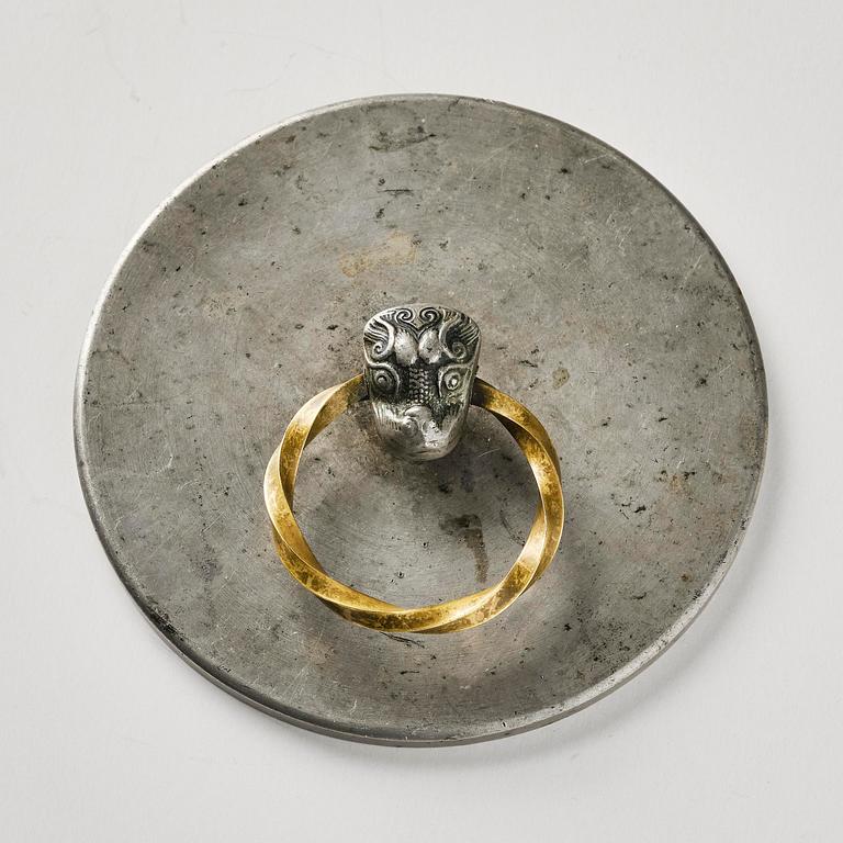 Firma Svenskt Tenn, a pewter and brass hand mirror model "A 1497", Stockholm, 1930s-40s.