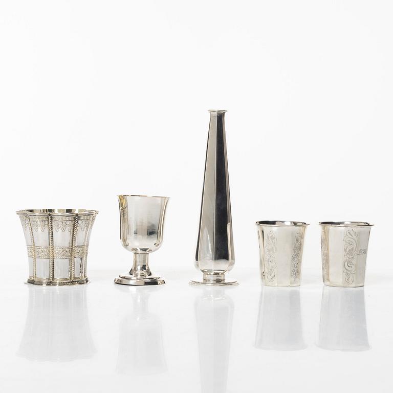 Three silver beakers, a vase and a cup, Sweden and Denmark, 19th-20th century.