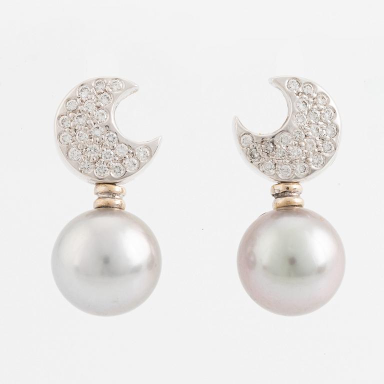 Brilliant cut diamond moon shape and cultured grey pearl earrings.