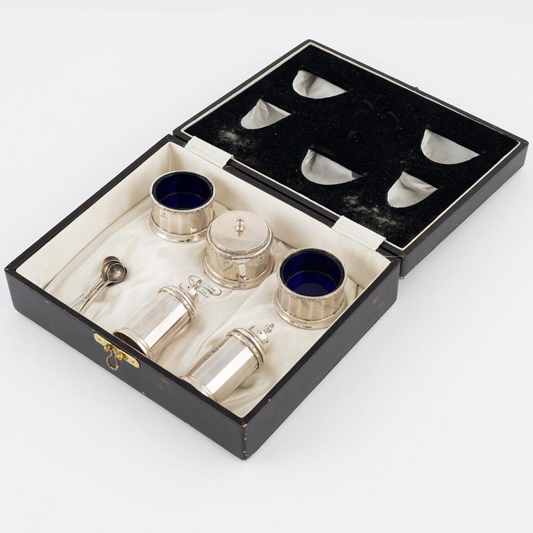 William Neale & Son Ltd, a 7-piece silver spice set, Birmingham, England, 1931.