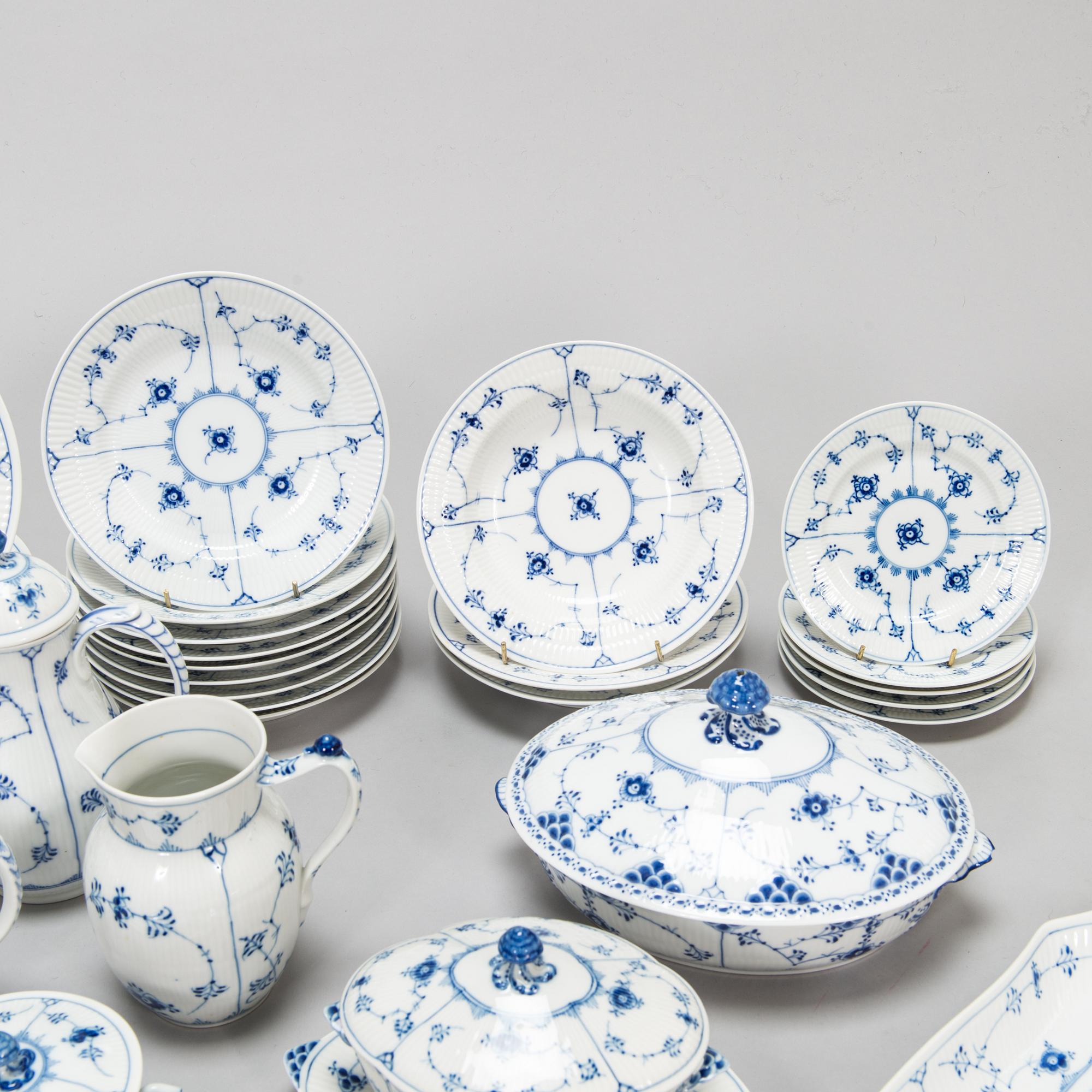 A 73-piece 'Blue Fluted Plain' porcelain tableware set, Copenhagen, Denmark, mostly 1940s-60s.