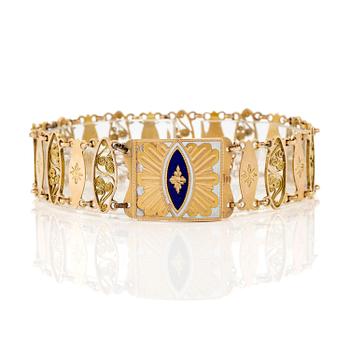 519A. A bracelet in 18K gold with enamel details.
