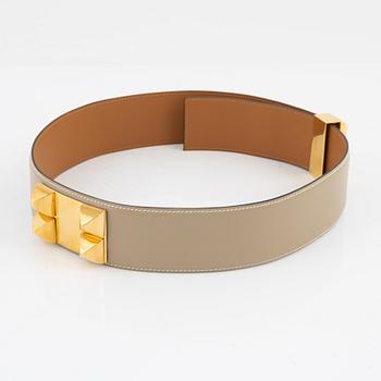 Hermès, a 'Collier de Chien' beige leather belt, 2003. Size 75.