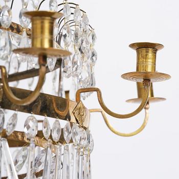 A late Gustavian thirteen-light gilt brass and cut glass chandelier, Stockholm, late 18th century.