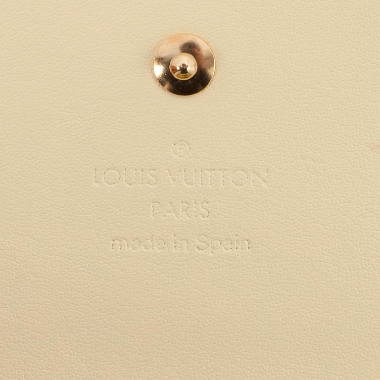 LOUIS VUITTON, a yellow vernis shoulder bag.