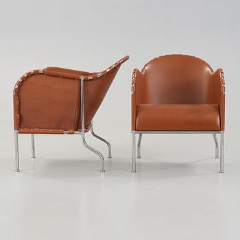 Mats Theselius, A pair of 'Bruno' brown leather and steel easy chairs, Källemo, Sweden.