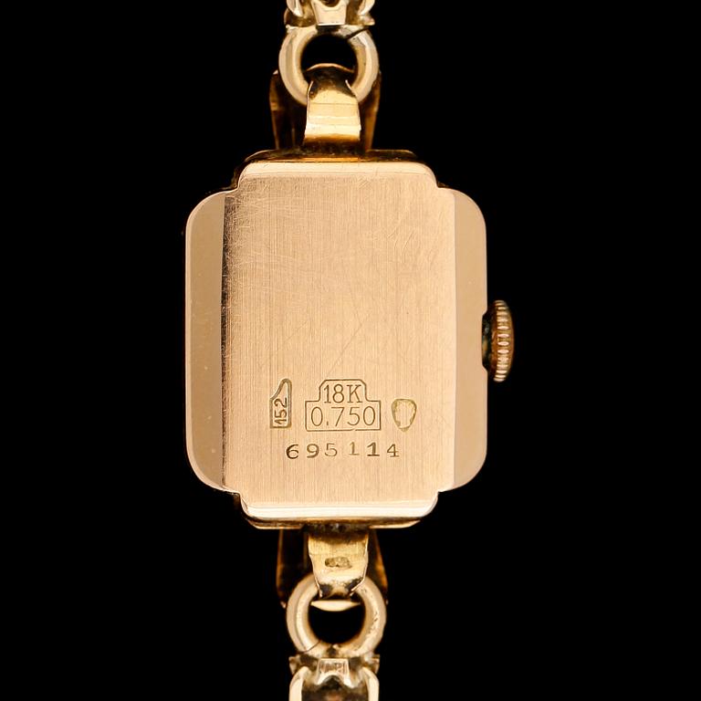 DAMARMBANDSUR, 18 k guld, Eiger, 1900-talets mitt. Total vikt inkl ur ca 21,4 g.