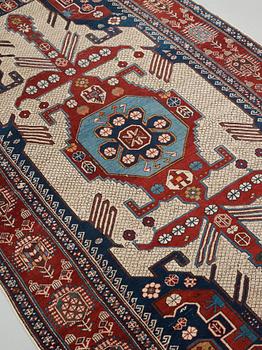 A CARPET, an antique/semi-antique Shirvan, ca 234 x 130 cm (as well as the ends with 1 cm flat weave).