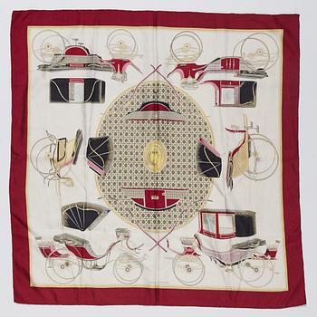 Hermès, a 'Les Voitures a Transformation' silk scarf.