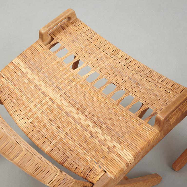 Hans J. Wegner, A pair of Hans J Wegner model 512 oak 'Folding Chairs' executed by Johannes Hansen, Denmark 1950's.